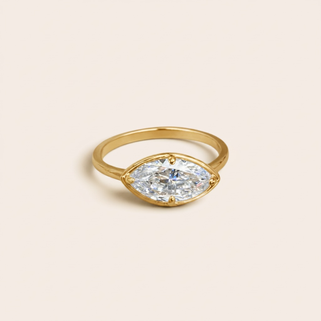 1.5 carat marquise diamond ring in solid 14K gold, featuring a modern east-west setting and delicate gold band, available in yellow gold, white gold, and rose gold.