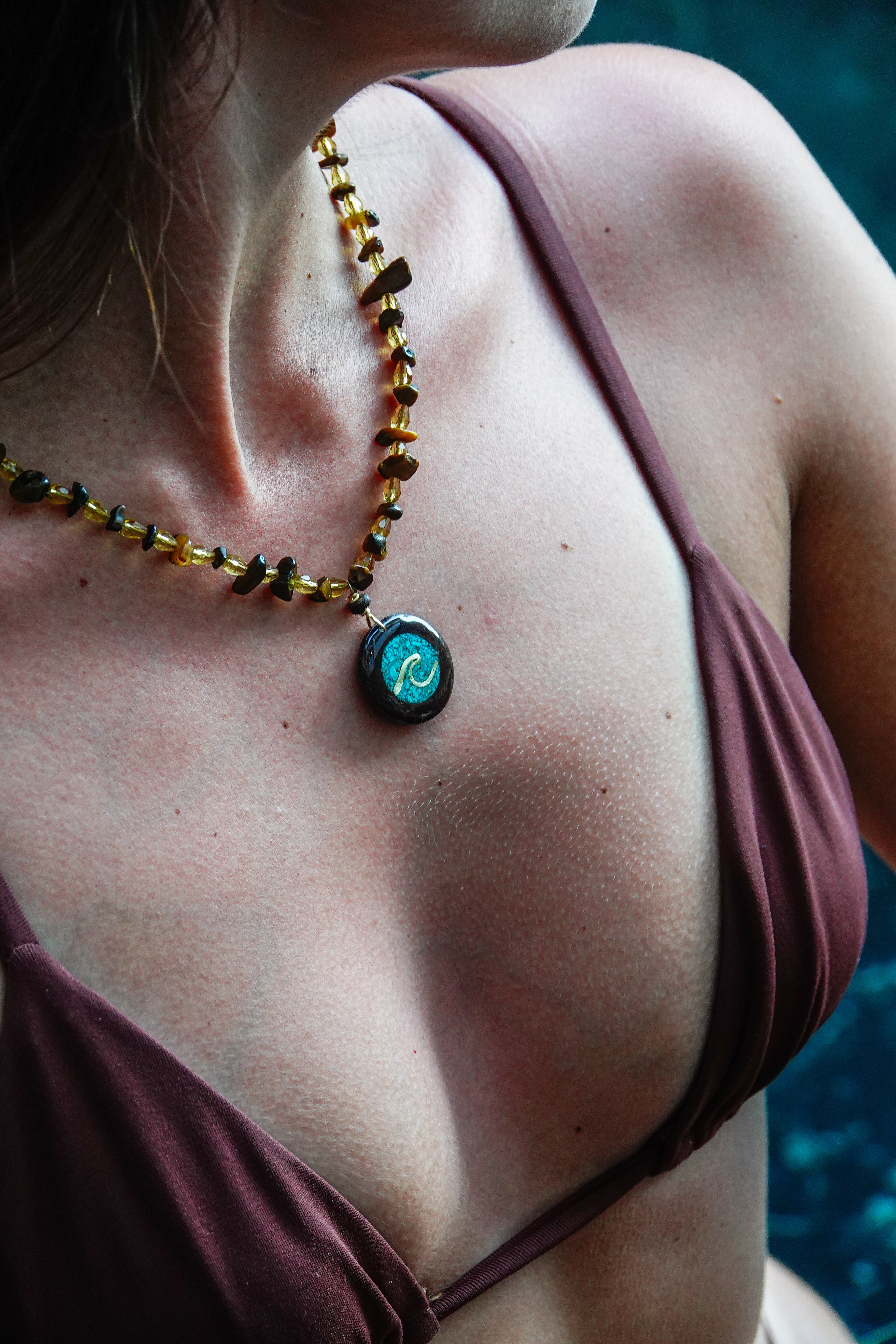 tiger eye necklace with wood and sand wave pendant
