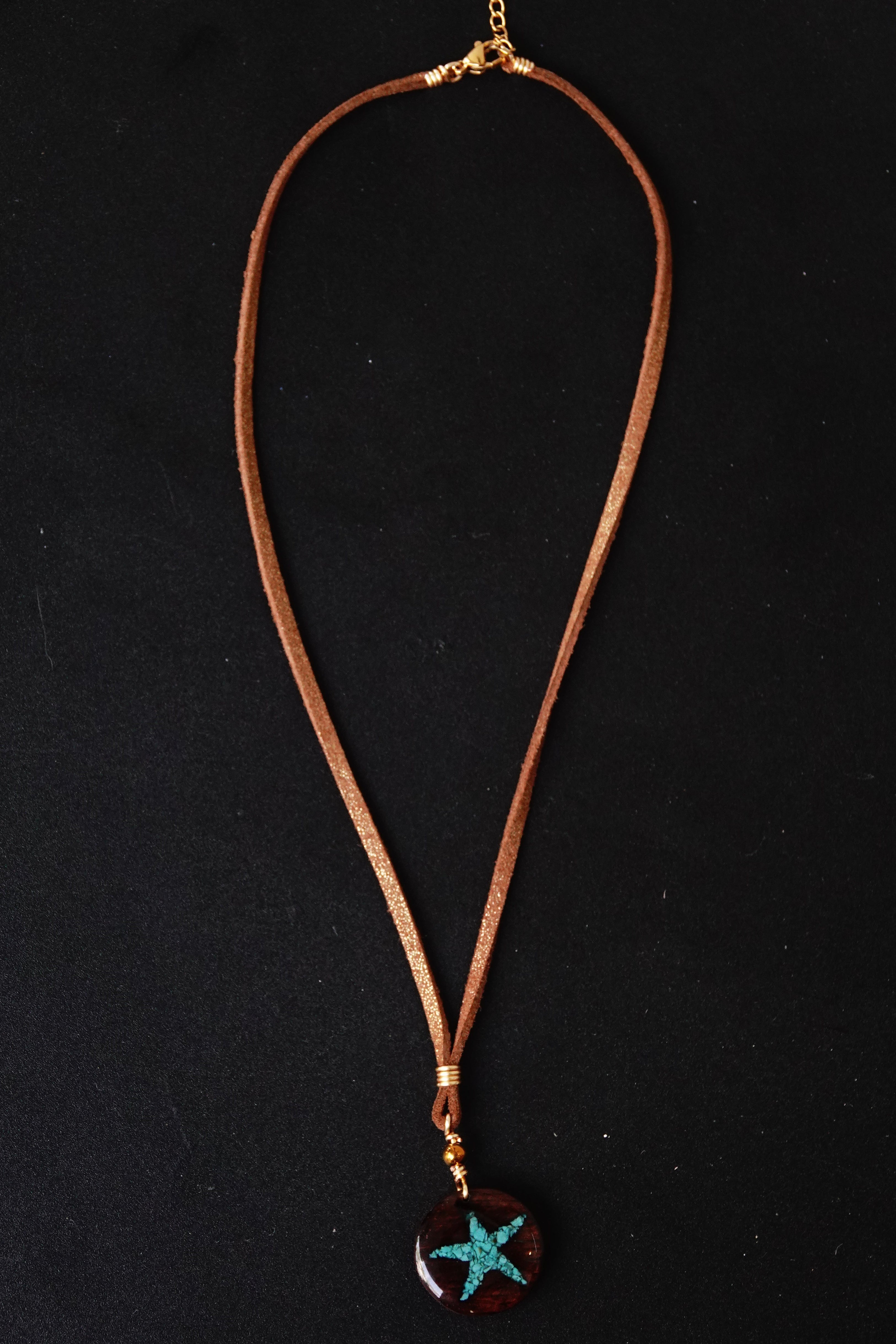 Leather Necklace with a blue sand star pendant 